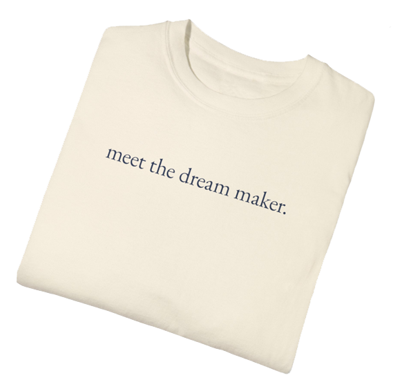 A custom T-shirt with the phrase "Meet the Dream Maker" on it.
